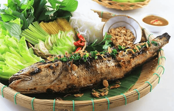 Món ăn cá lóc nướng trui nổi tiếng ở vùng sông nước 